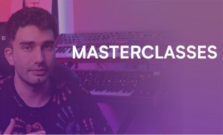 A man in a black shirt sits at a keyboard, focused on a Masterclass session.


